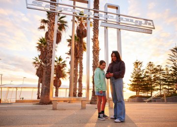 Mum and daughter exploring the Scarborough Beach Play Trail